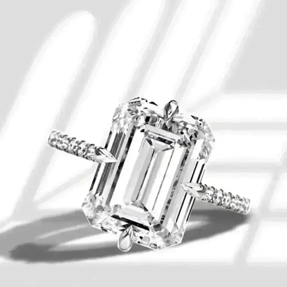 Italo Jewelry Hidden Halo Emerald Cut Engagement and pave band